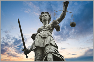 Lady Justice holding the scales of justice and the sword of truth